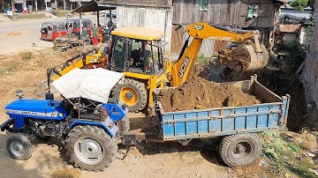 JCB Backhoe Loader Digging Field For Home Construction and Loading Mud in Tractor - JCB Video
