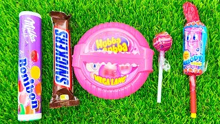 Satisfying video asmr lollipops candy and chocolate gummy candy Cutting video