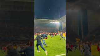 Hawk fans are in the field with the joy of winning the match. #football #sports