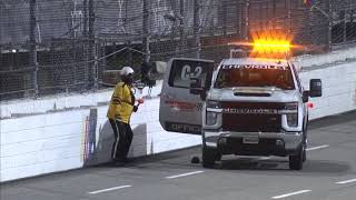 Track crew member picks up a hammer and loses a hat