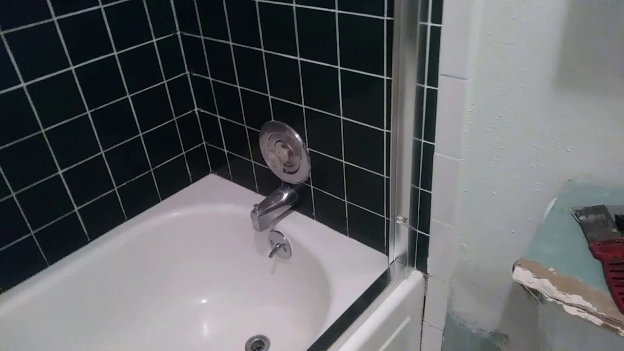 Installing a bathtub sliding shower door YouTube