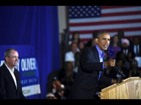 Obama blasts 'politics of division' on return to campaign trail