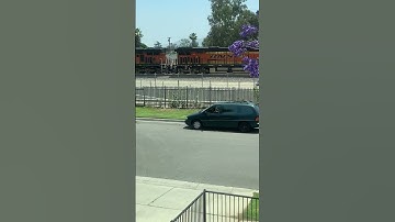 BNSF lashup with H3 Dash-9 edited