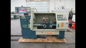 Bridgeport Romi EZ-Path CNC Engine Lathe w/ Manual Tool Turret, Tailstock, Chip Pan & Coolant System