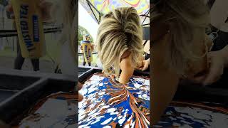 Blue Orange White Black and Gold Body Marbling Dip by BLVisuals at Faster Horses Festival 2023