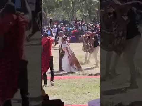 Miyanda Hichilema enters the arena for her Traditional wedding in a traditional ila warrior dance