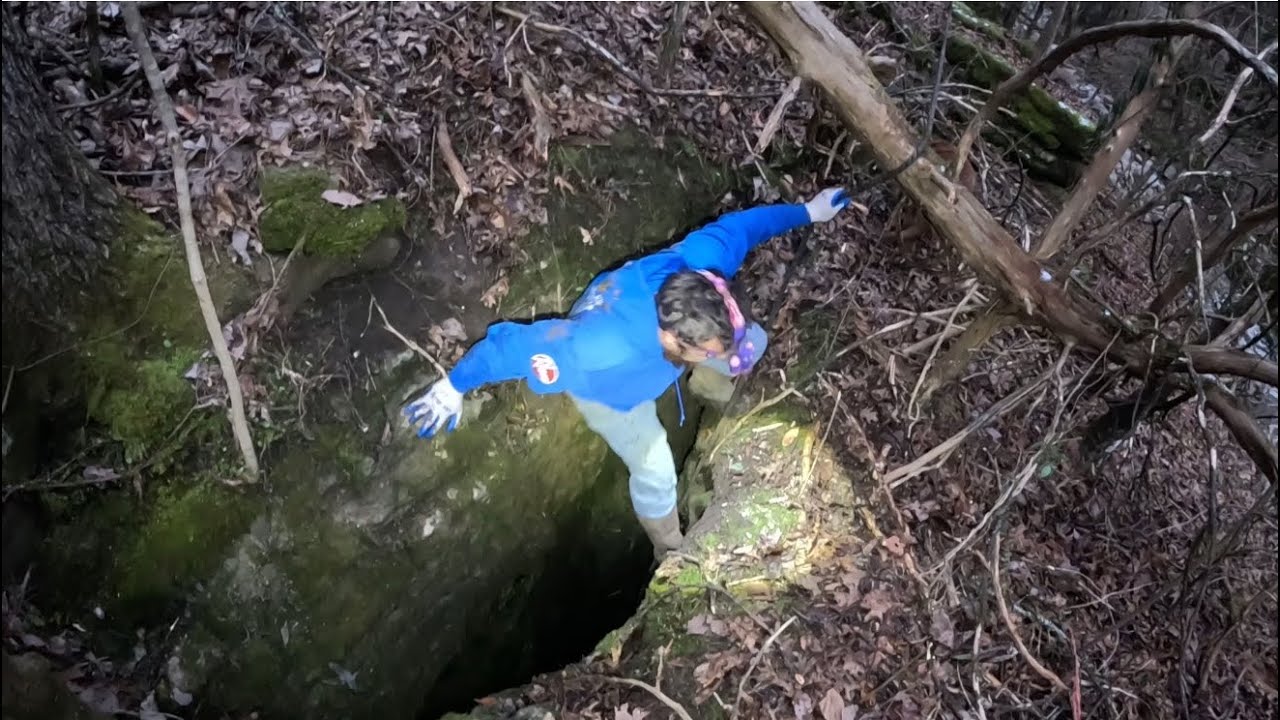 Exploring a Hidden Spring Cave with the Homeowner - YouTube