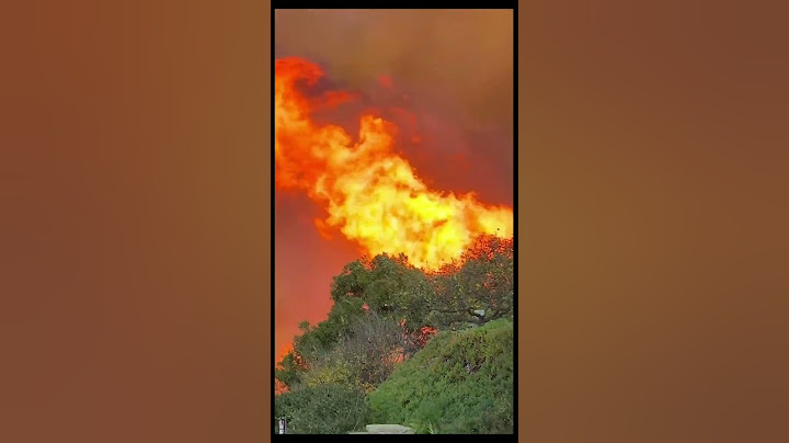 Fire crews battle largest wildfires in Los Angeles' history