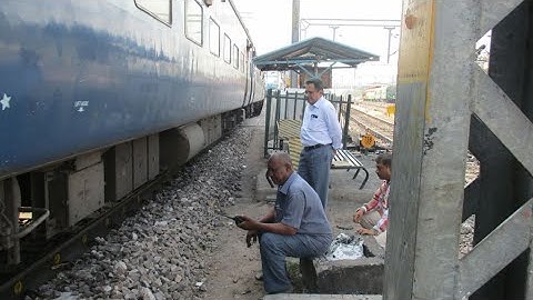 Rolling-IN and Rolling-Out Examination of Trains During Arrival and Departure Through Stations