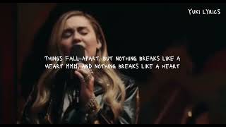 Mark Ronson - Nothing breaks like a heart ( lyrics ) ft. Miley Cyrus