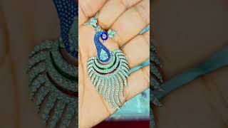 Zirconia with Meena work... Designs that no one can ignore.#peacock #business #jewellery
