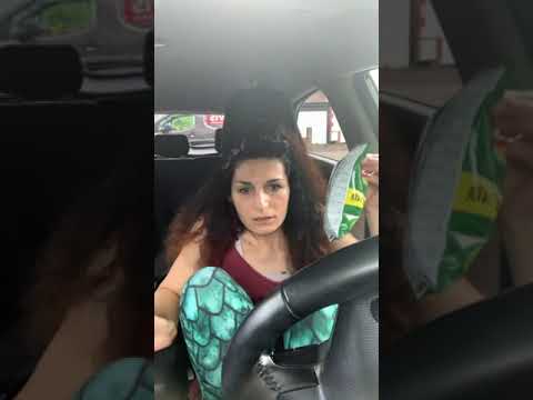 Feet up in car and tasting snacks