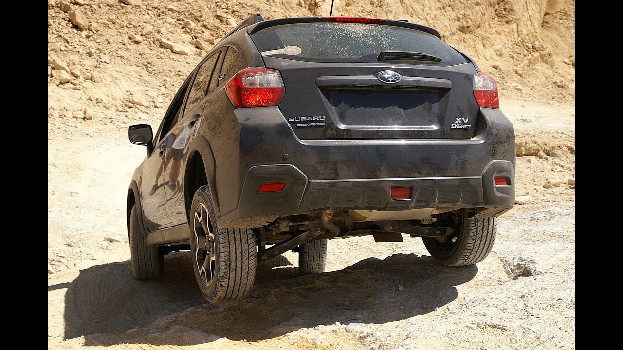 SUBARU XV Crosstrek Eats Snow, Mud and Stones For Breakfast - YouTube