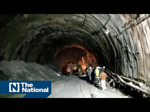 Tunnel collapse in India leaves construction workers trapped