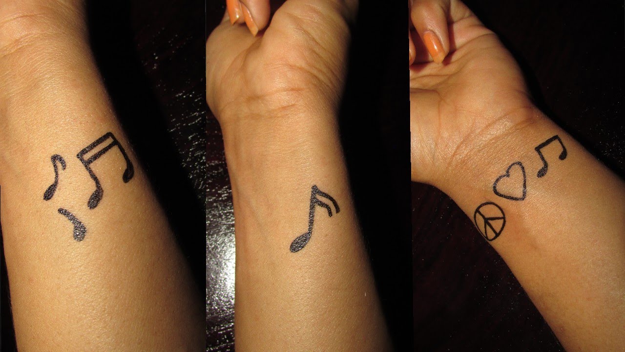 Matching music themed best friends wrist tattoos.