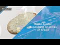 Garlic butter depositing on slices of bread [FoodJet food depositor]