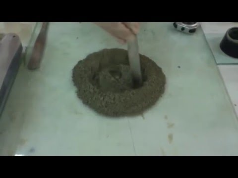 فحص تعيين القوام القياسي لعجينة الاسمنت تجربة 1 مختبر الخرسانة