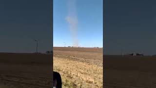 15 July 2022- Dust devil over bare fields N. Texas...