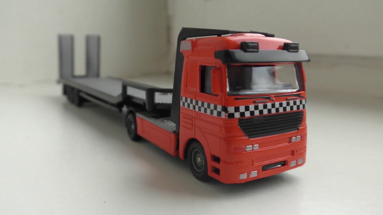 small toy cars and trucks