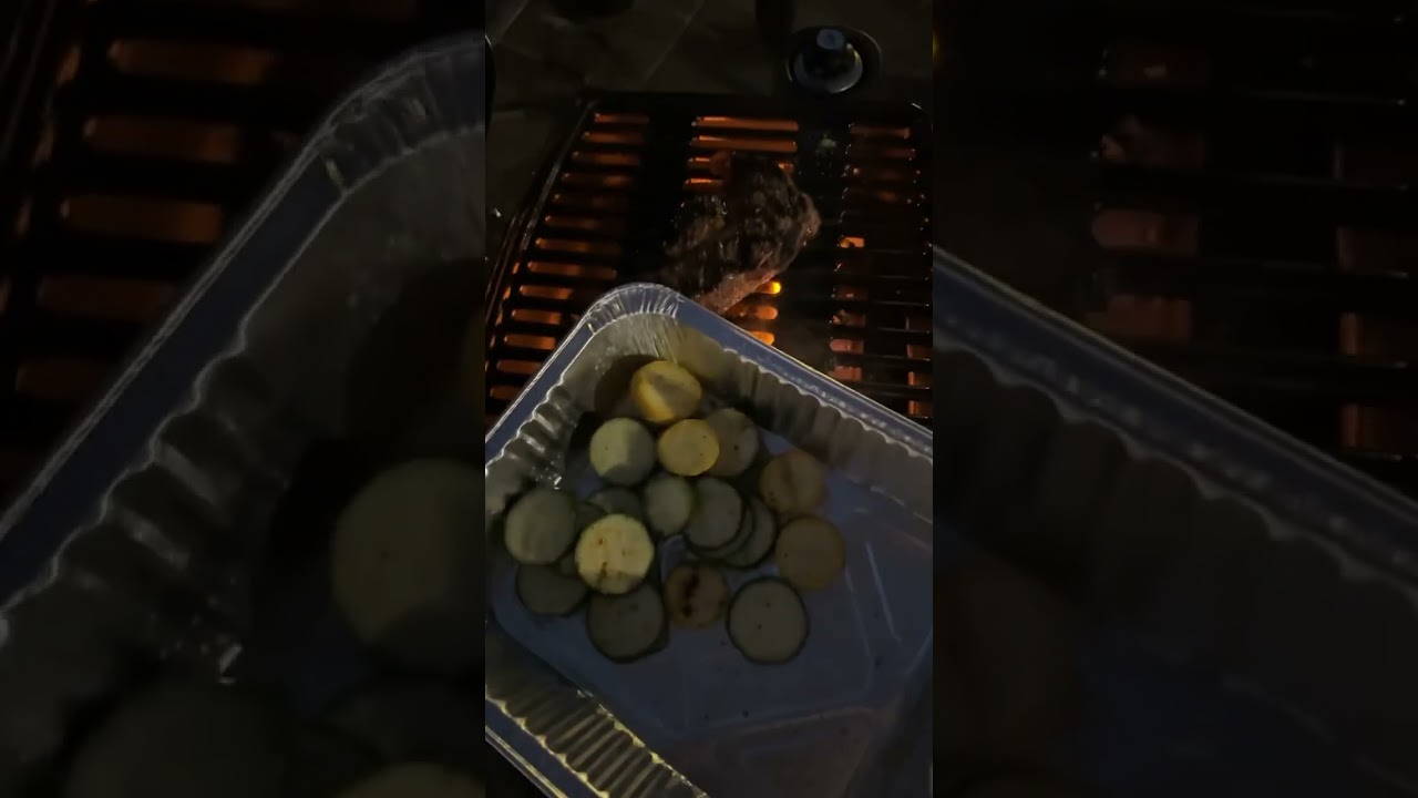 Grilling a new york steak in Pismo beach, california