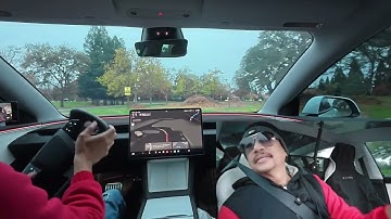 FSD v14.2.1 Initial Drive with Two Interventions and Multiple Wiper Activations