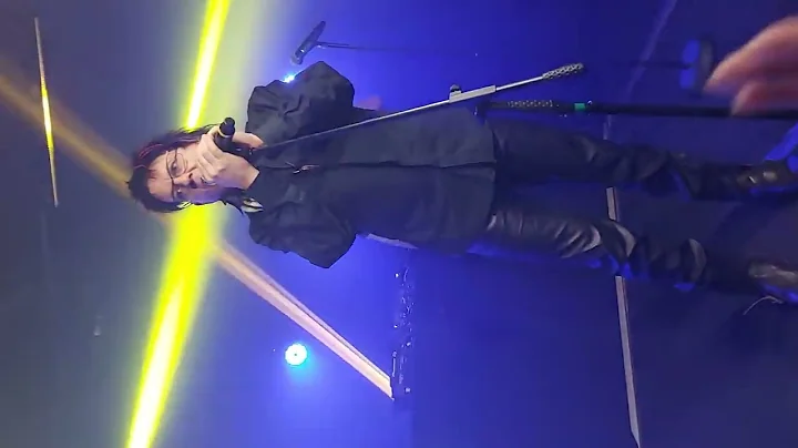 Kurt Larson of Information Society show  singing a...