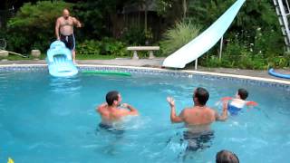 Body surfing down a waterslide
