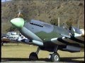 Spitfire Mk XVI, Sir Tim Wallis, greets Spitfire Mk XIV, Mark Hanna at Wanaka New Zealand 1994.