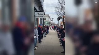 Michigan community moved 9,100 books, one by one, to their new home