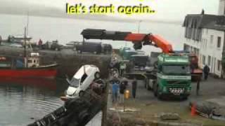 Lorry loader falls in to the harbour.wmv