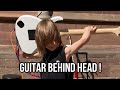 Cool kid guitar behind head trick  age 9  crowd love it  amazing talented piratesofthecaribbean