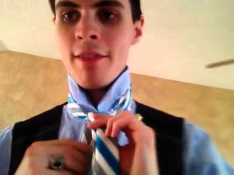 How to tie a tie tutorial: The Trinity knot - YouTube