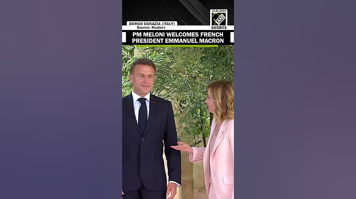 G7 Summit Italia: Italian Prime Minister Georgia Meloni welcomes French President Emmanuel Macron