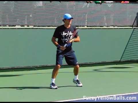 www.fuzzyyellowballs.com This is a video of Roger Federer hitting forehands in slow motion. It was filmed at the BNP Paribas Open in Indian Wells in March of 2009. For video lessons on how to hit Federer's forehand and more slow motion clips, please visit www.fuzzyyellowballs.com !