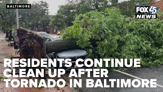 Residents continue clean up after tornado in Baltimore