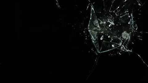 Slow Motion Rock Shatters Sheet of Glass