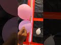 Two || balloon || burst || red || &|| white || colour