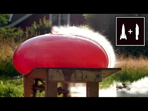 Rocket Knife -VS- Giant Water Balloon (Beautiful slow motion)