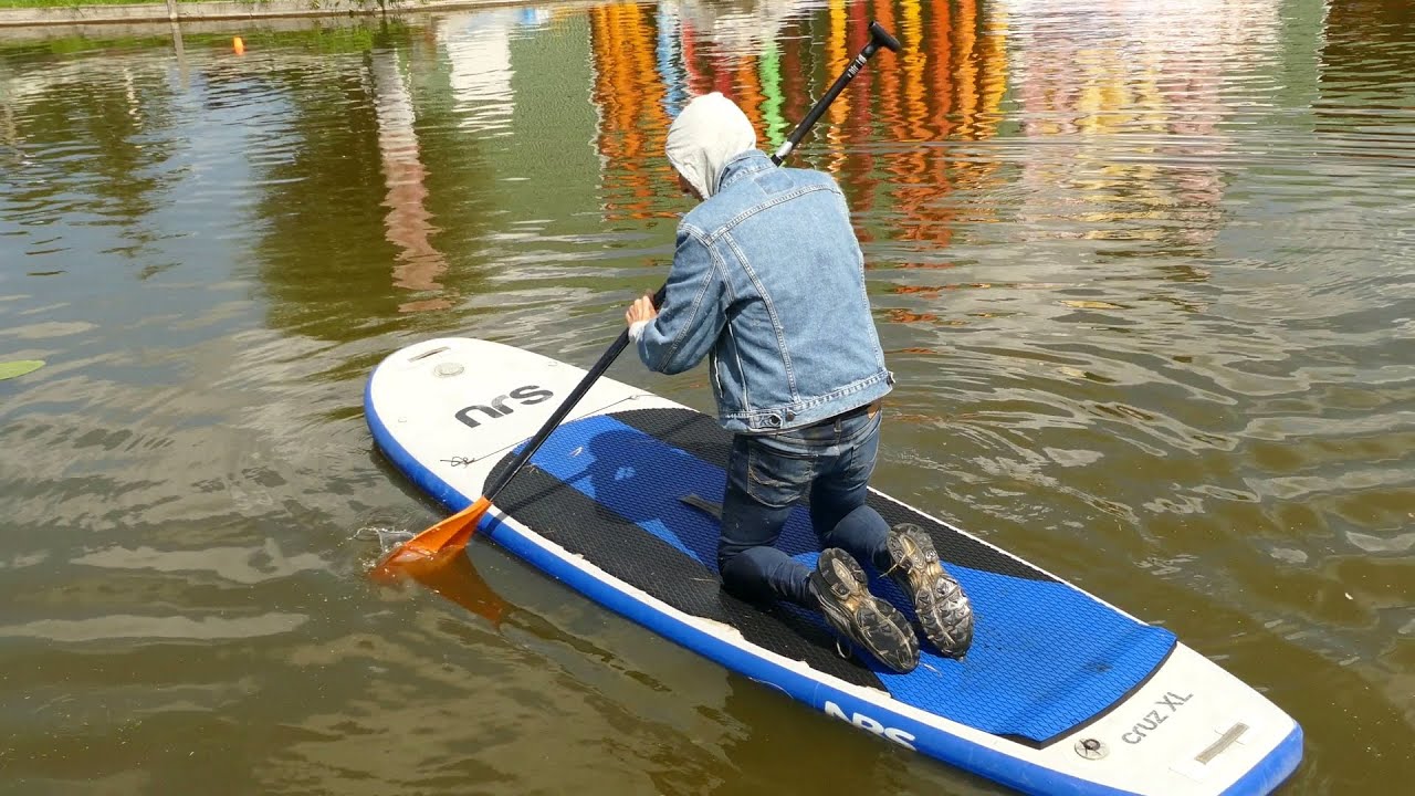 Paddleboard dunking.