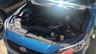 SUBARU IMPREZA - Coolant reservoir location