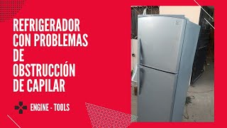 refrigerador hace una bola de hielo a la entrada del evaporador, cambio de tubo capilar y filtro.