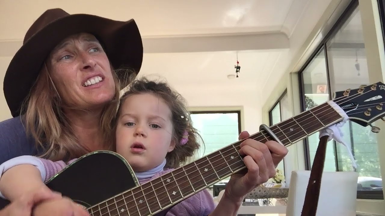 2016 age 4: My Madeleine & I at home; teaching her to play guitar. “Everyone gather to the chapel.”