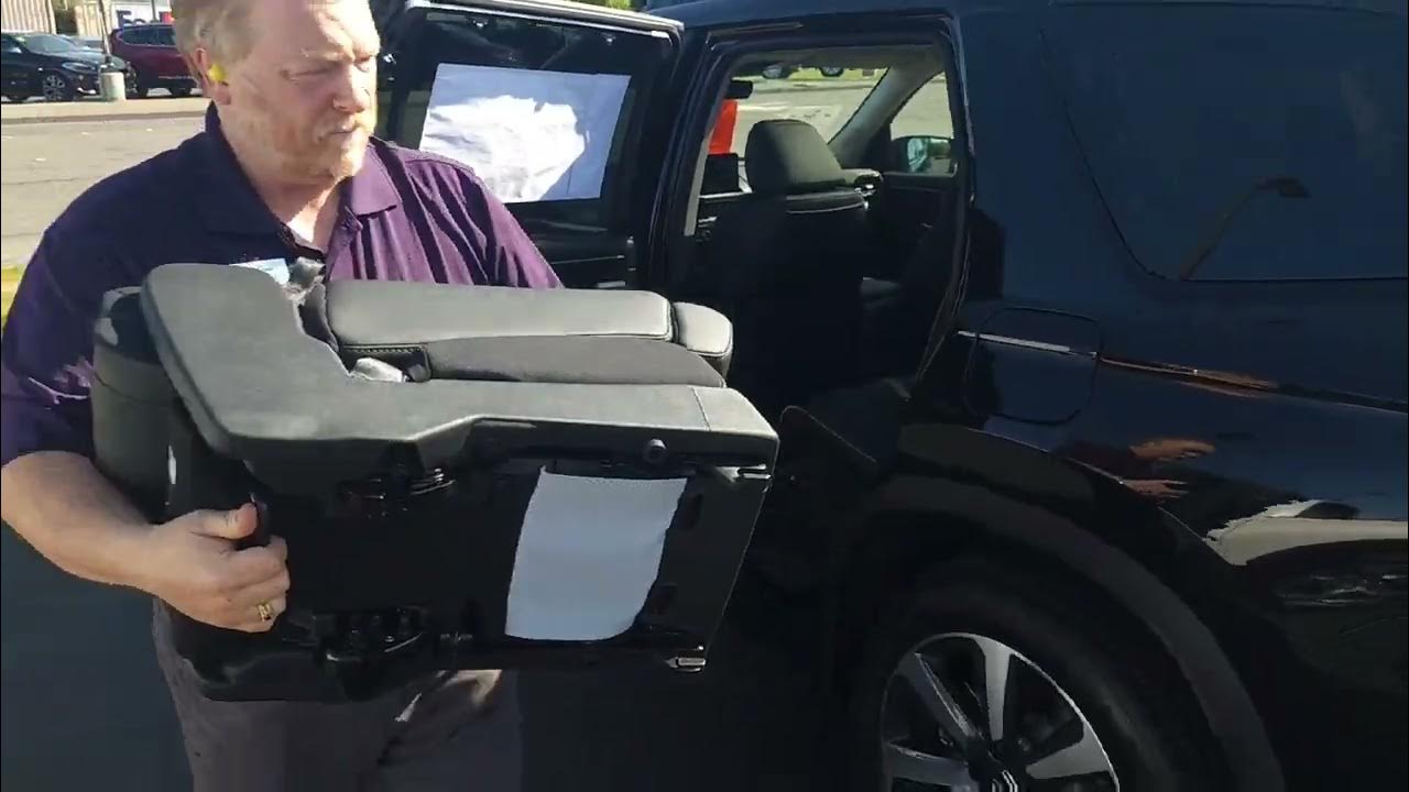 How to remove and store the 2nd row stowable center seat in a 2023