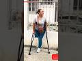 Amputee lady crutches life: walking stronger independently #limbloss #crutches