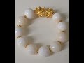 health, fortune  charm and good luck piyao fossil clam pearl  bracelet from natural blister.