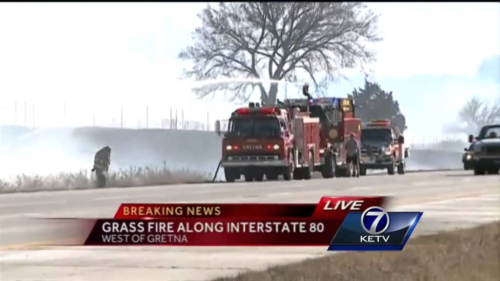 Multiple departments battle grass fire along I-80 near Gretna - YouTube