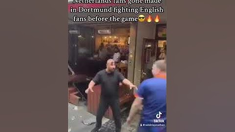 Netherlands fans fighting against English Fans  at a Dortmund pub😂😂