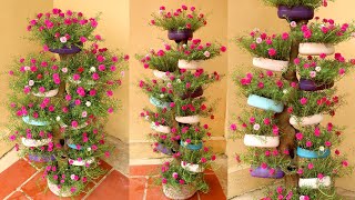 Recycling plastic bottles into vertical gardens, garden on dry tree