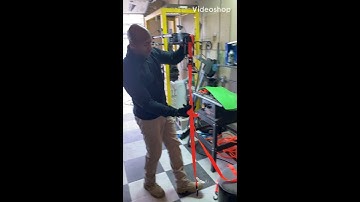 Remove and replace hood spring from a classic car