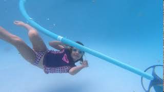 Weeva swimming in the pool